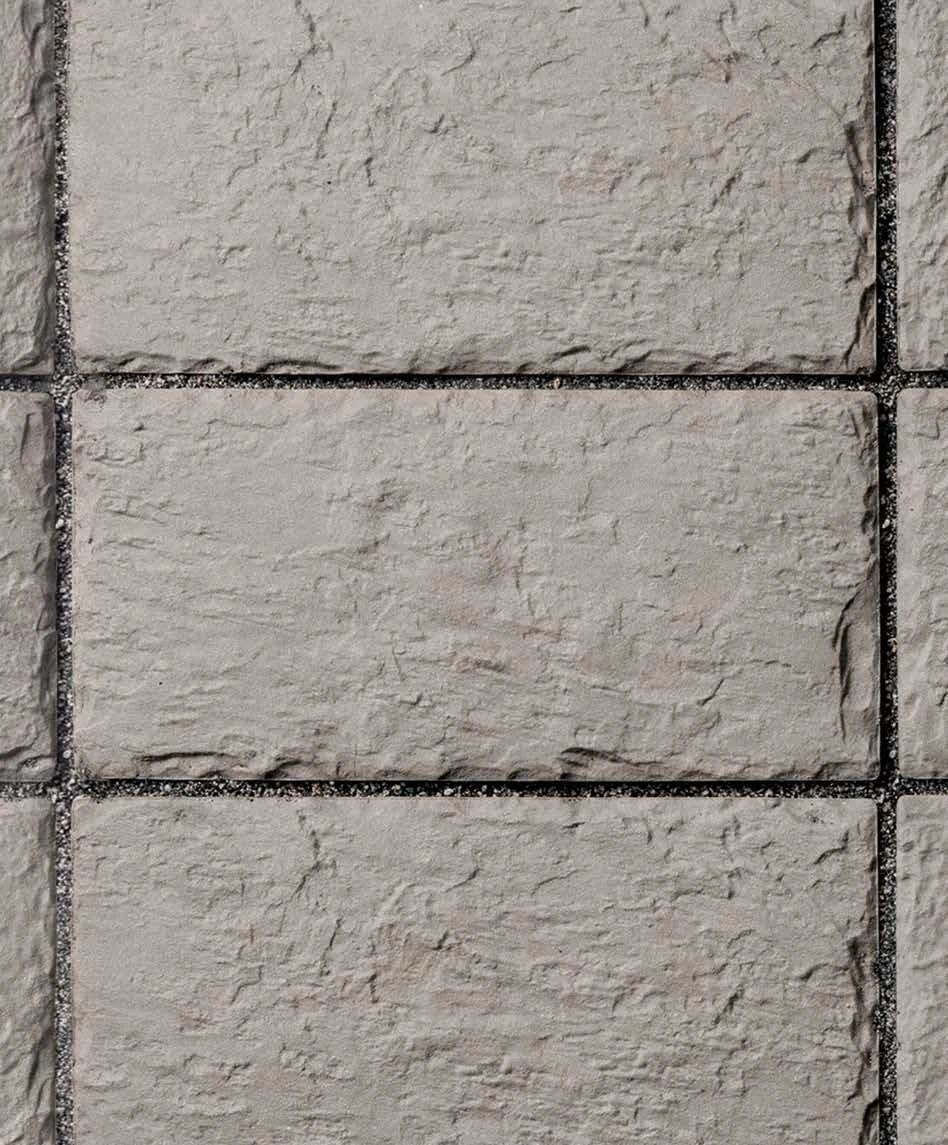 nowoczesny podjazd z kostki brukowej szary kolor.webp